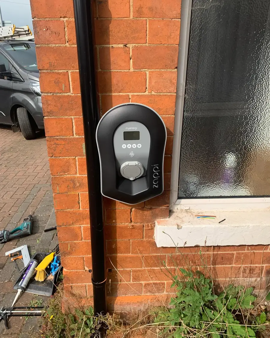 Zappi myenergi EV charge point fitted beside a doorway