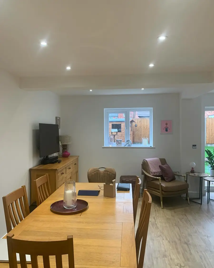 Open plan living and dining room with recessed LED downlights