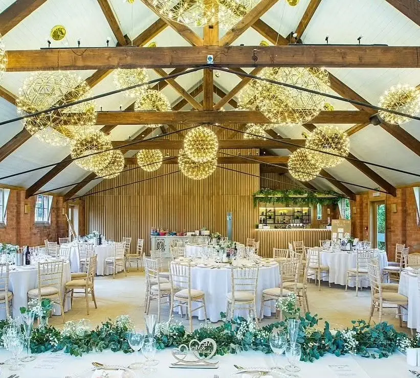 Barn events venue with suspended starburst feature lighting